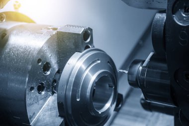 CNC Torna makinası metal halka şeklindeki parçaları kesme işleminde kullanılır. CNC dönüşüm makinesi tarafından çalışan yüksek teknoloji metali. .