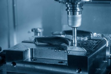 CNC değirmen makinesi, dizinlenebilir son değirmen araçlarıyla enjeksiyon küf parçalarını kesiyor. Kalıplar ve ölüm üretim süreci, son değirmen araçları ile makine merkezi tarafından.