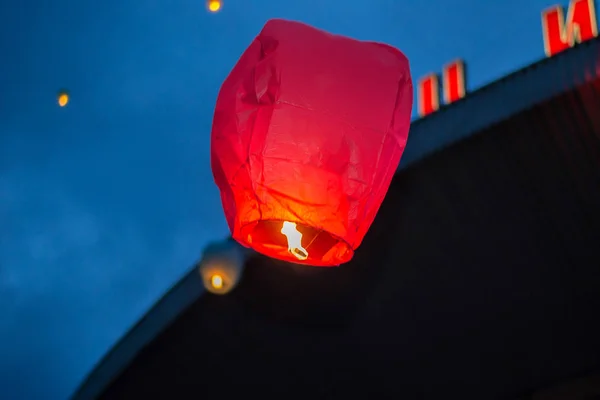 Sky lantern flying at night