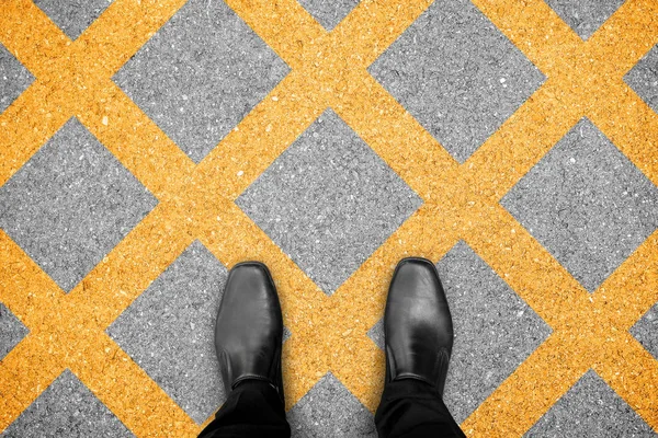 Black Shoes Standing Parking Zone Criss Cross Yellow Line Painted — Stock Photo, Image