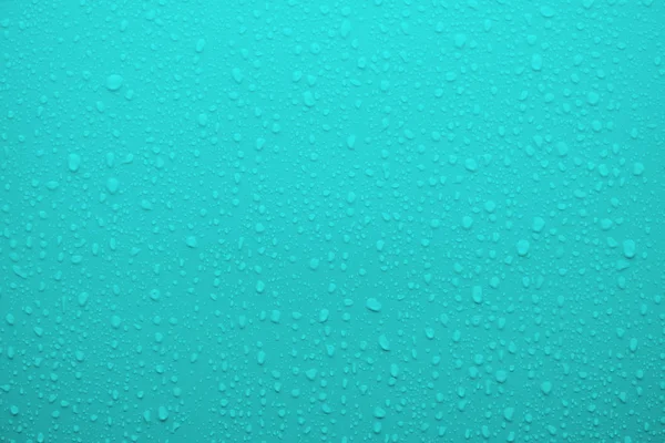シアン ブルー画面の背景として凝縮水にドロップします — ストック写真