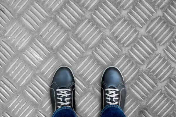 Black Casual Shoes Standing Industrial Stainless Steel Platform Floor — Stock Photo, Image