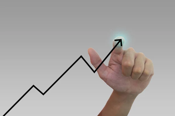 Hand pointing at increasing graph about business, economic, stock market.