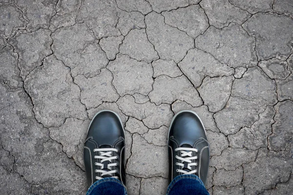 Black Casual Shoes Standing Damage Subside Asphalt Concrete Floor Representing — Stock Photo, Image