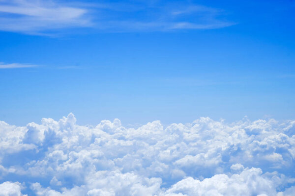 Blue sky above the clouds