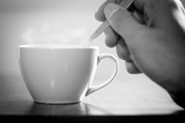 One Using Spoon Mixing Hot Coffee Sugar Cream Monotone Effect — Stock Photo, Image