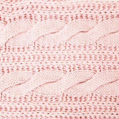 Arka plan doku açık pembe renkli örgü. Kumaş Tekstil arka plan. Pembe yün doku deseninin