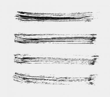 dört siyah fırça darbeleri