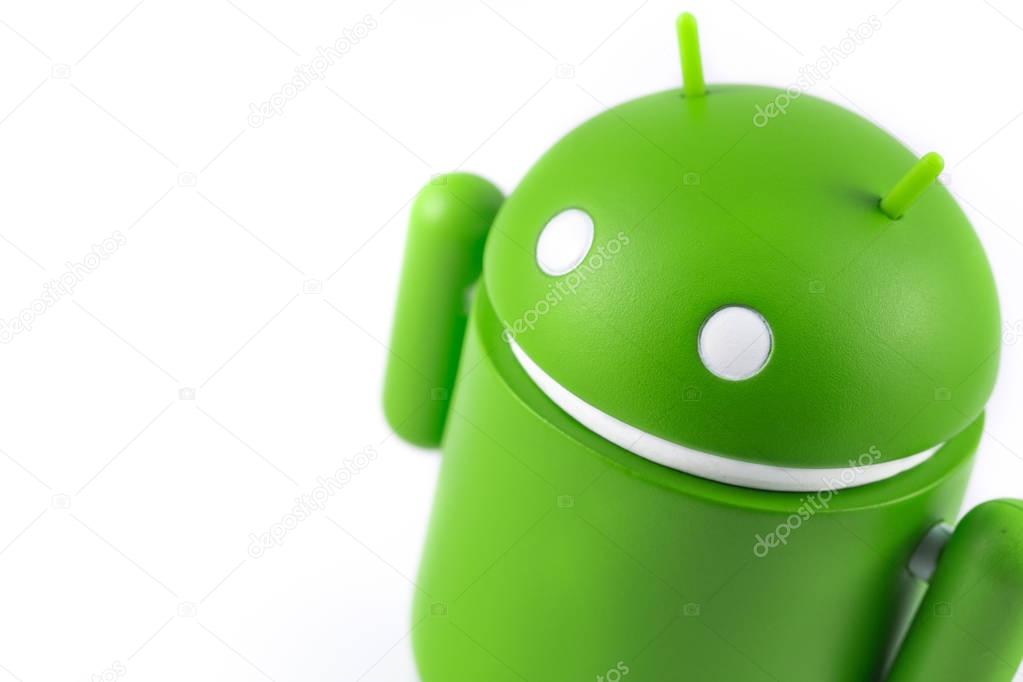 Android figure on the white background.  Android is the operating system for smart phones, tablet computers, e-books, game consoles,  and other devices. Ekaterinburg, Russia - October 15, 201