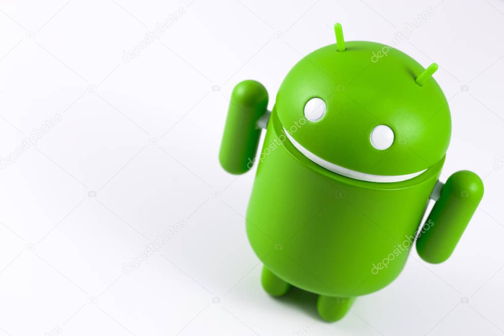 Android symbol figure on the white background.  Android is the operating system for smart phones, tablet computers, e-books, game consoles,  and other devices. Ekaterinburg, Russia - October 15, 201