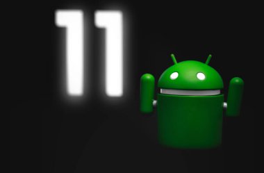 Google Android figürü Android 11 sürümünü karanlıkta ekranda gösteriyor. Google Android akıllı telefonlar, tablet bilgisayarlar, e-kitaplar, oyun konsolları ve diğer cihazlar için bir işletim sistemidir. Moskova, Rusya - 18 Aralık 2019