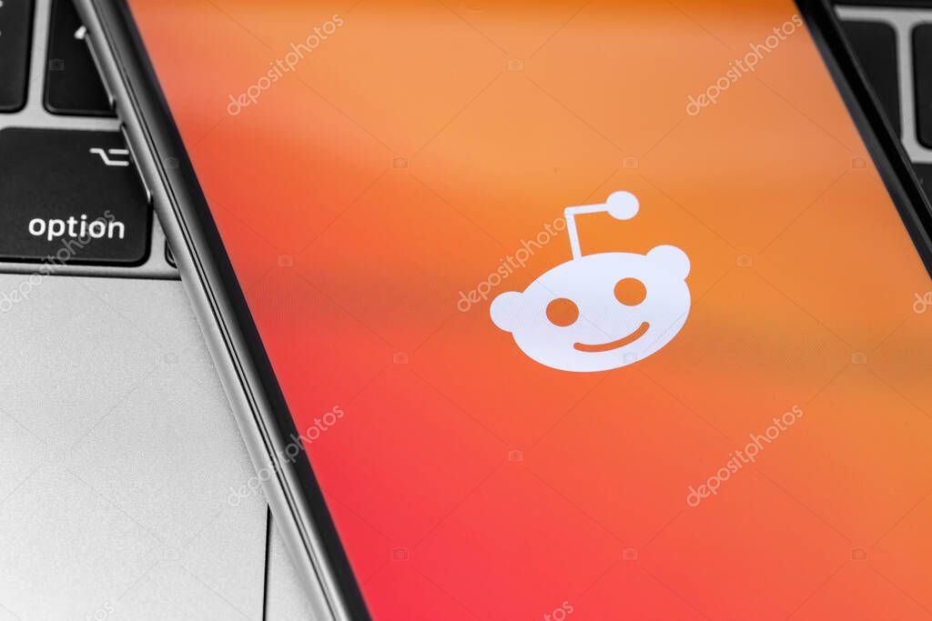 Reddit symbol displayed on smartphone. Reddit - Social News Site. Moscow, Russia - November 15, 2019