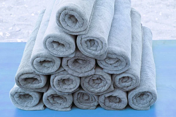 beach towels rolled up in rolls, towels and body care