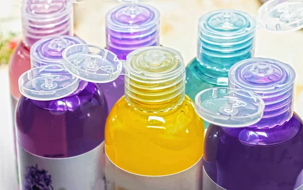 colored bottles for cosmetics, cosmetics and shampoos,