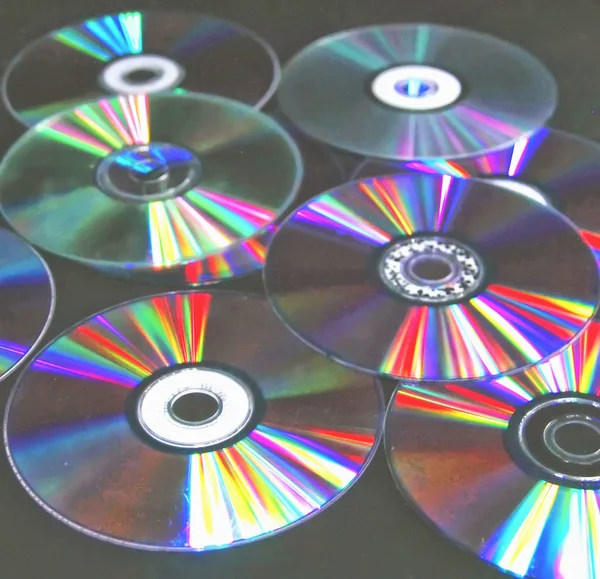 CD DVD на черном фоне современные технологии цветовые спецификации — стоковое фото