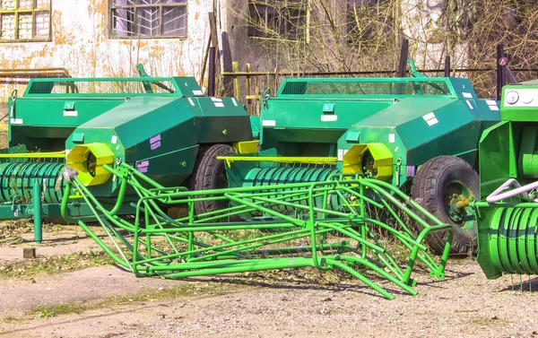 Harvesters and harvester parts at the plant are waiting for asse