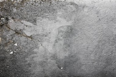 gri doku duvar üzerinde çizik sıva ile,