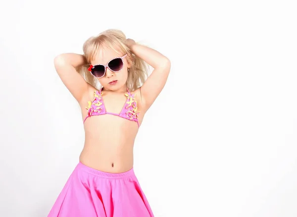 Beautiful girl in bathing suit and glasses showing emotions, on — Stock Photo, Image