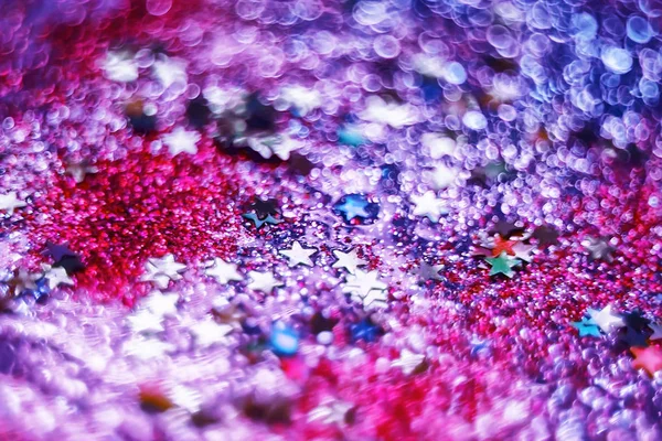 candies, sparkles and sparkling dust, texture of a bright blurre