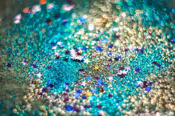 candies, sparkles and sparkling dust, texture of a bright blurre