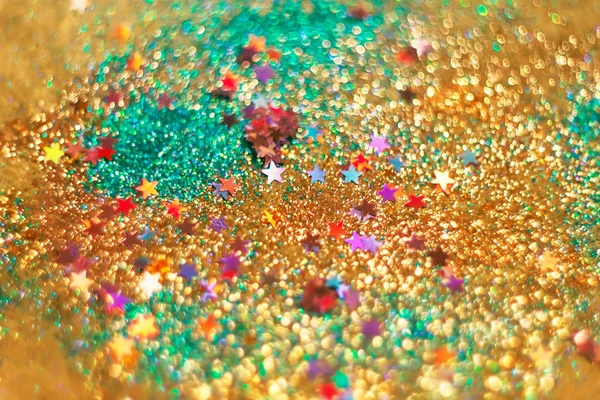 candies, sparkles and sparkling dust, texture of a bright blurre