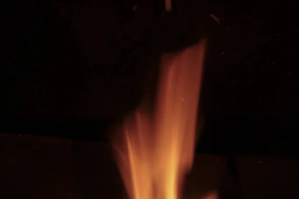 Flames of fire in a fireplace. — Stock Photo, Image