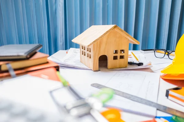 Property engineering contractor working desk tablet with wood ho — Stock Photo, Image