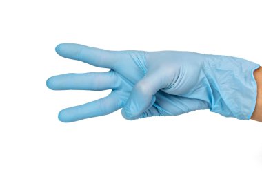 Doktor el eldiven gösterir üç numara
