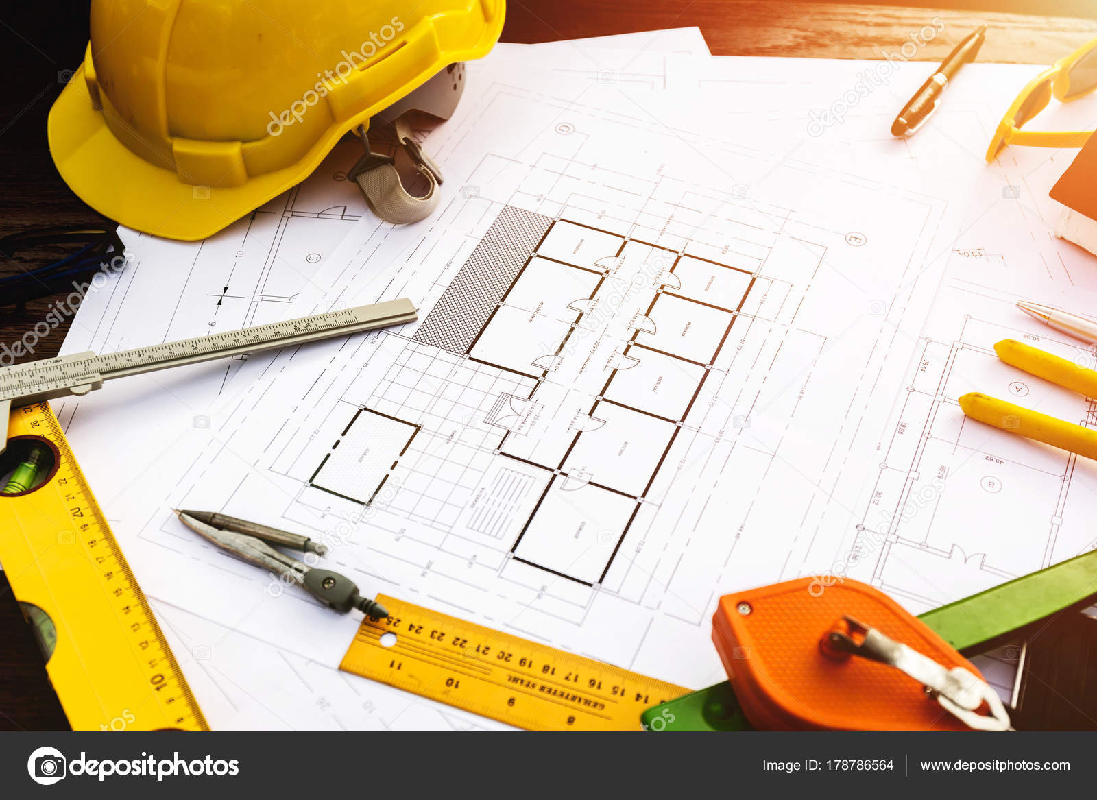 A Desk Of Contractor Engineers Who Are Going To Build A Low Cost