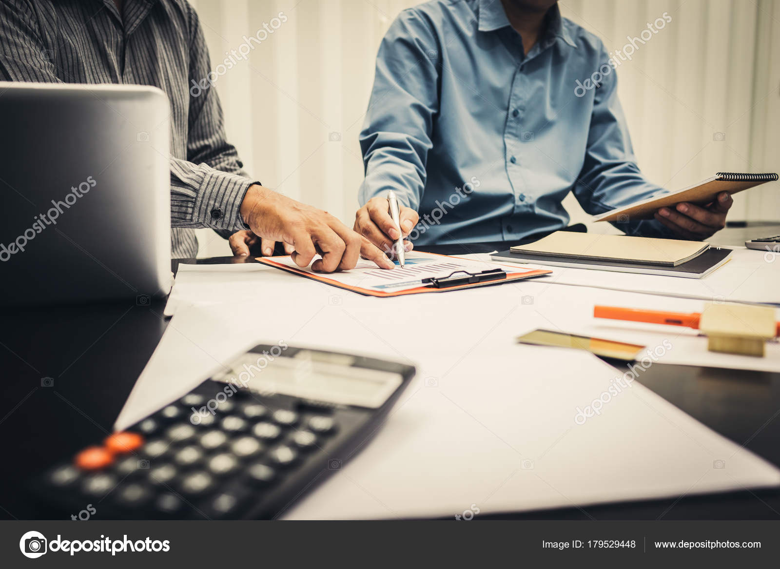 Male Bankers Calculating Figures Home Property Trading Taxes Infomation ...