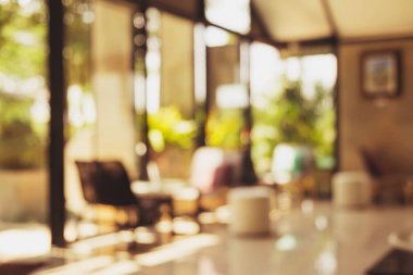 Yemek Oda bulanık Restoran yiyecek depolamak ile kanepe dekorasyon alışveriş arka plan afiş olarak kullanmak için.