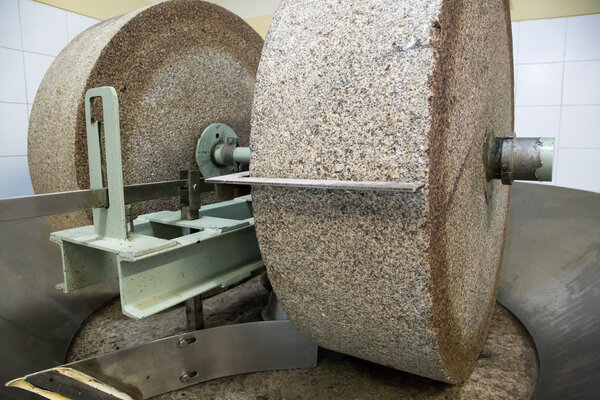 Grinding stone in olive oil factory