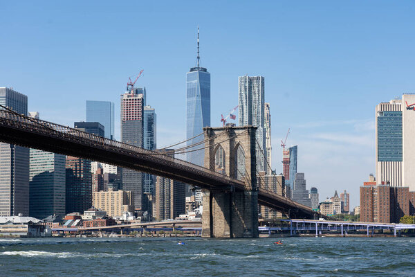 New York, United States - September 22, 2019: View of famous Brooklyn Bridge towards Lower Manhattan in New York City.