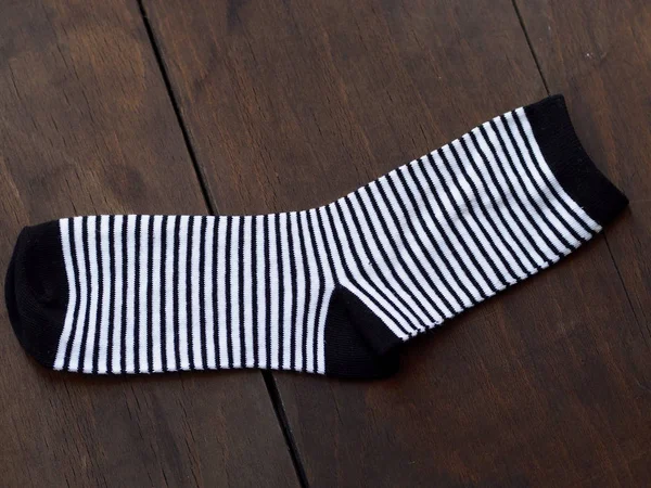 Socken auf Holz Hintergrund — Stockfoto