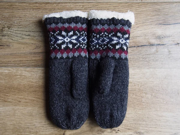 Mittens on wood background — Stock Photo, Image