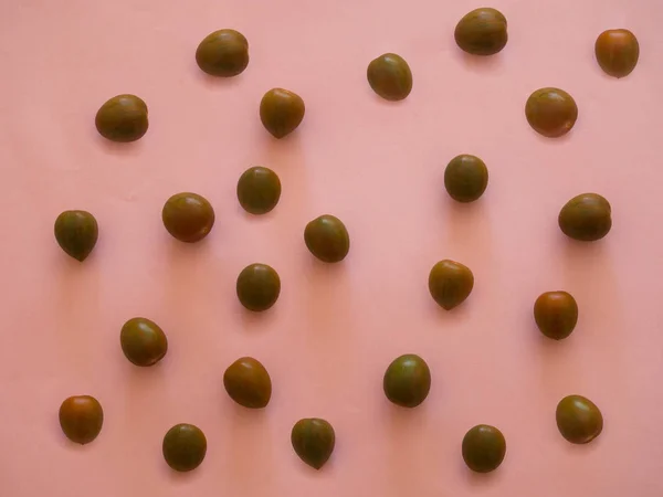 ピンクの背景パターン平織りトマト — ストック写真