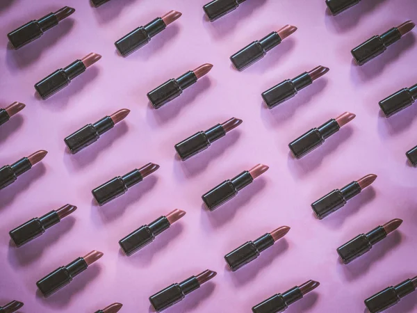 Wzór szminki na różowym tle — Zdjęcie stockowe