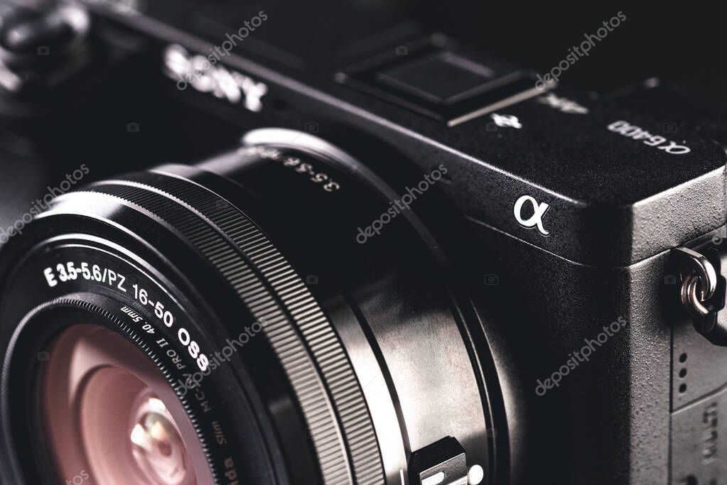 Graz, Austria - July 07, 2019: Camera Sony closeup of the logo of APC S matrix Alpha 6400. Illustrative background