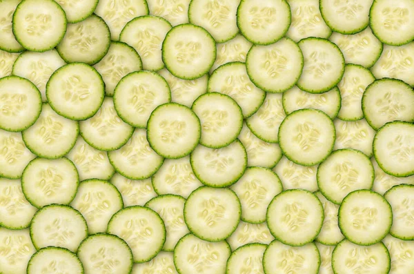 Fresh organic cucumber slices natural juicy background. — Stockfoto