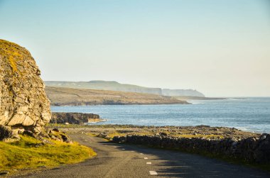 Lime stone shore in Irelan county Clare. Travel landscape on sunny day.