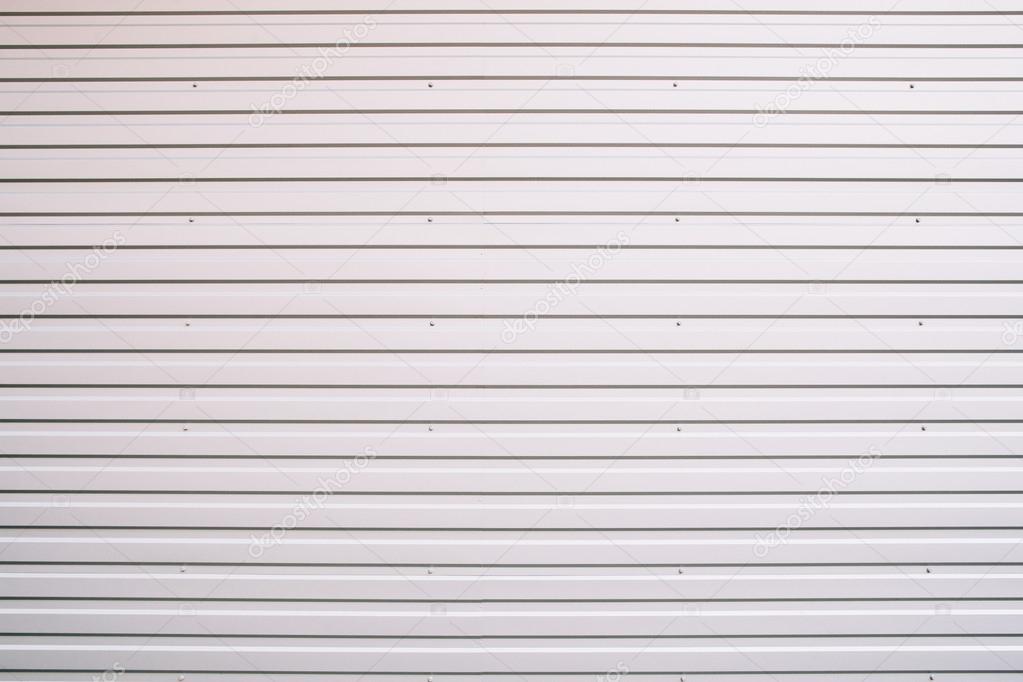 Metal gray shutter door texture, close-up
