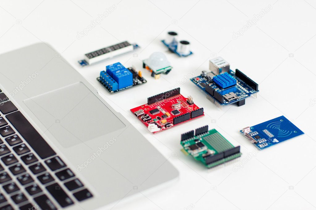 Colorful electronic components near laptop