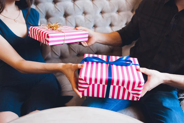Couple giving gifts for each other — Stock Photo, Image
