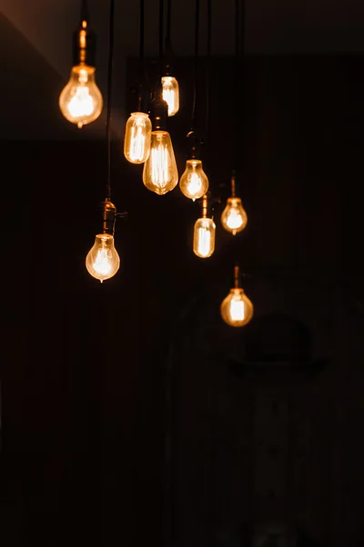 Incandescent lamps in a modern loft. Edison lamp. — Stock Photo, Image