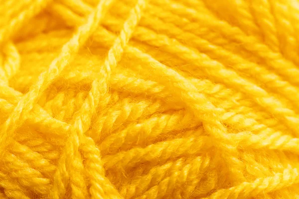 Texture du fil à tricoter jaune, toile de fond artisanale — Photo