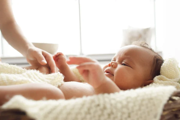 Little baby playing with mother hand, free space — Stock Photo, Image