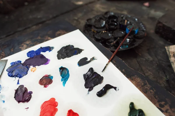 Painting hobby art process hand paint on palette Stock Photo by