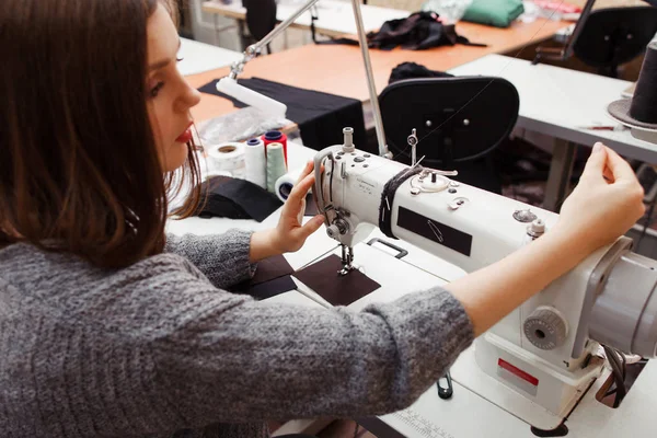 Seamstress tuning sewing machine for work