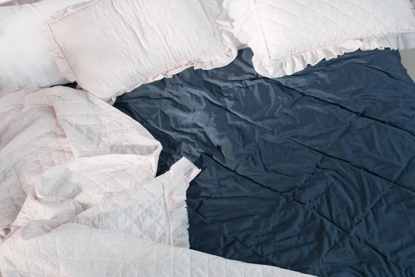 Rumpled bed after sleeping top view, free space — Stock Photo, Image