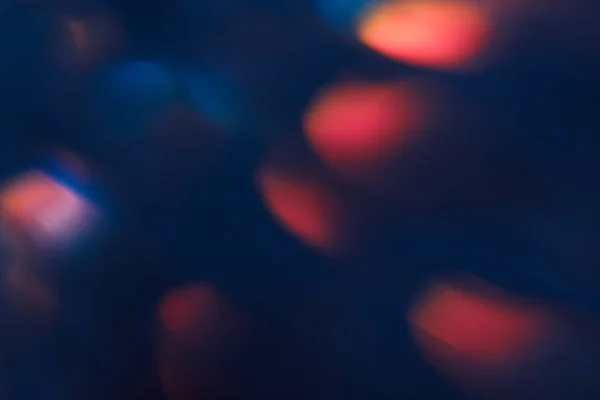 Abstract blurred glittering shine, teal and red — Stock Photo, Image